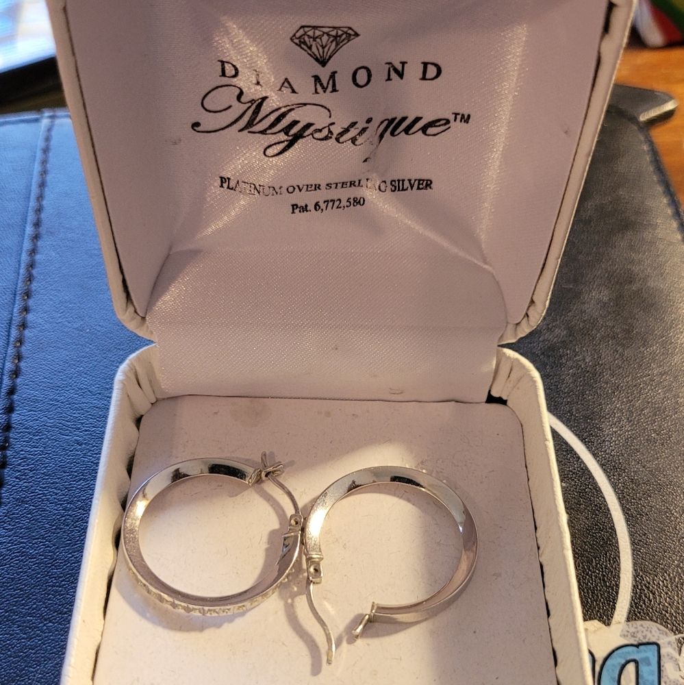 Diamond Mystique Platinum Over Silver Earrings.